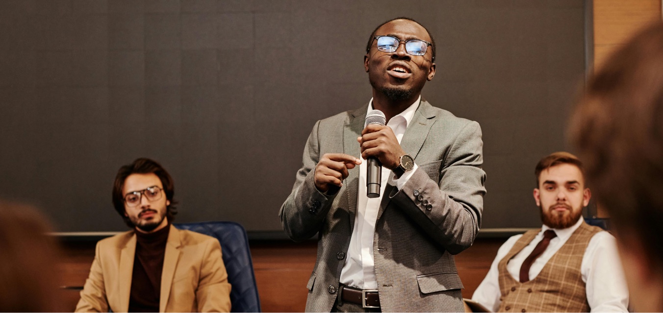 High-skilled immigration professional speaking at a panel