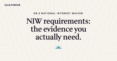 Immigration attorney organizing evidence exhibits for an EB-2 national interest waiver petition.
