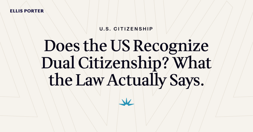 Person holding two passports while reviewing US dual citizenship rules.