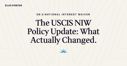 Applicant reading the January 2025 USCIS Policy Manual update on national interest waiver petitions.